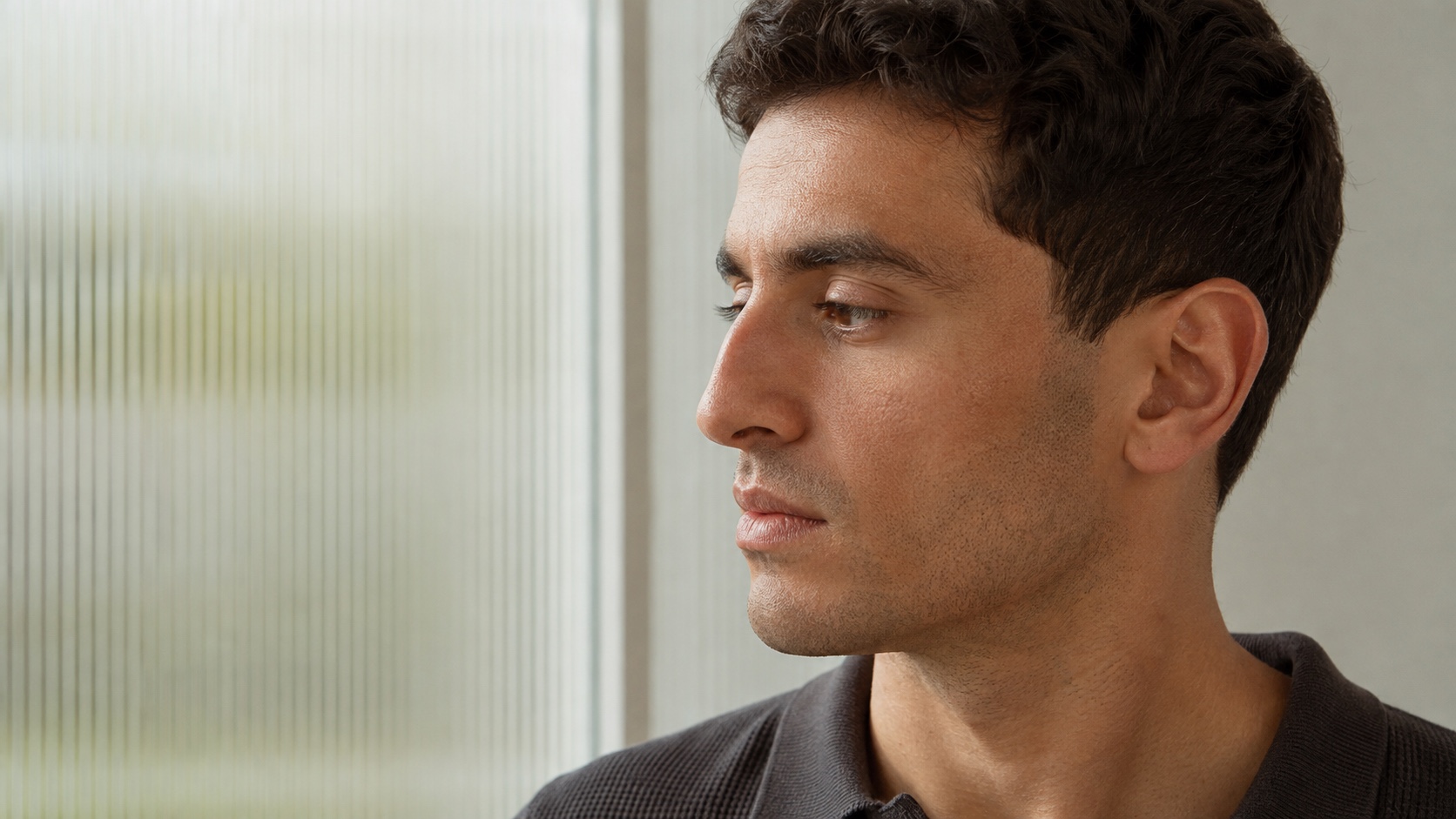 Side profile of a man showing the natural contour of his nose